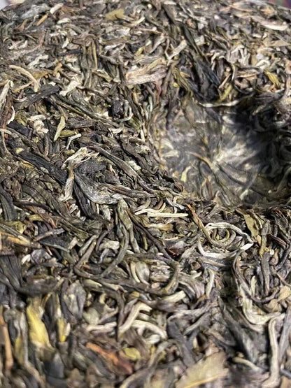 Yiwu Early Spring Golden Phoenix Tea Flower Fragrance Pu'er Tea Cake Tea 357g