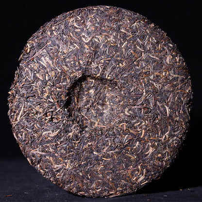 2006 Silver Needle Tributary Puer Meng Hai Qiao Mu Ye Sheng Cha Raw Pu'er 250g