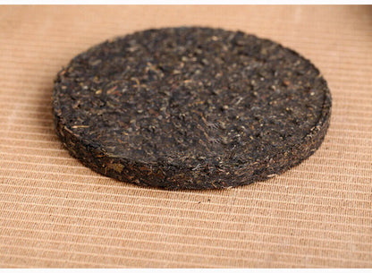 2007 XIAGUAN T8653 Discus Puerh Tea Cake Raw Puer Sheng Pu'er Aged Puerh 357g