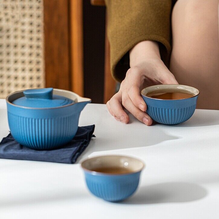 on sales porcelain tea set for travel tea pot with infuser hole cup portable bag