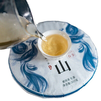 357g/12.59oz DaXueshan Pu'er Raw Tea Organic Spring Ancient Seven Seed Cake Tea