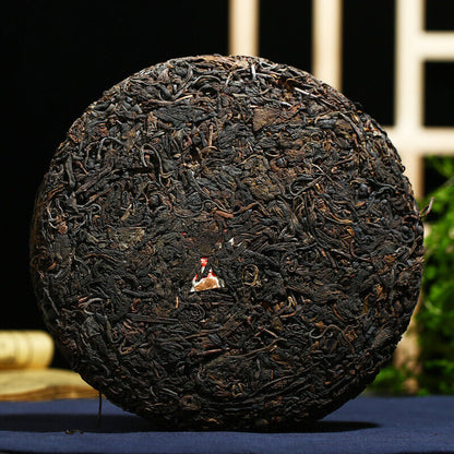 2003 Kong Ming Shan Pressed Qizi Cake of Yiwu Classic Tea Puerh Puer Raw 357g