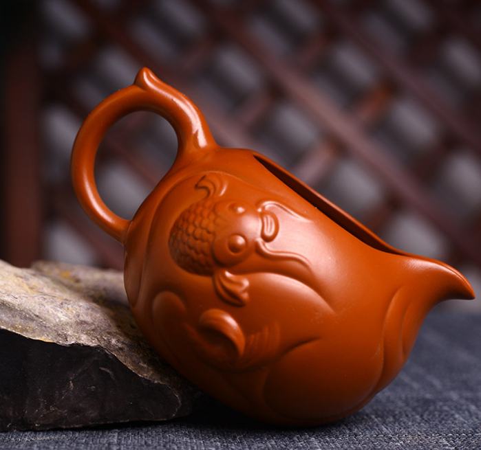 Yixing genuine handmade raw ore Dahongpao fish Hualong fair cup purple clay pot