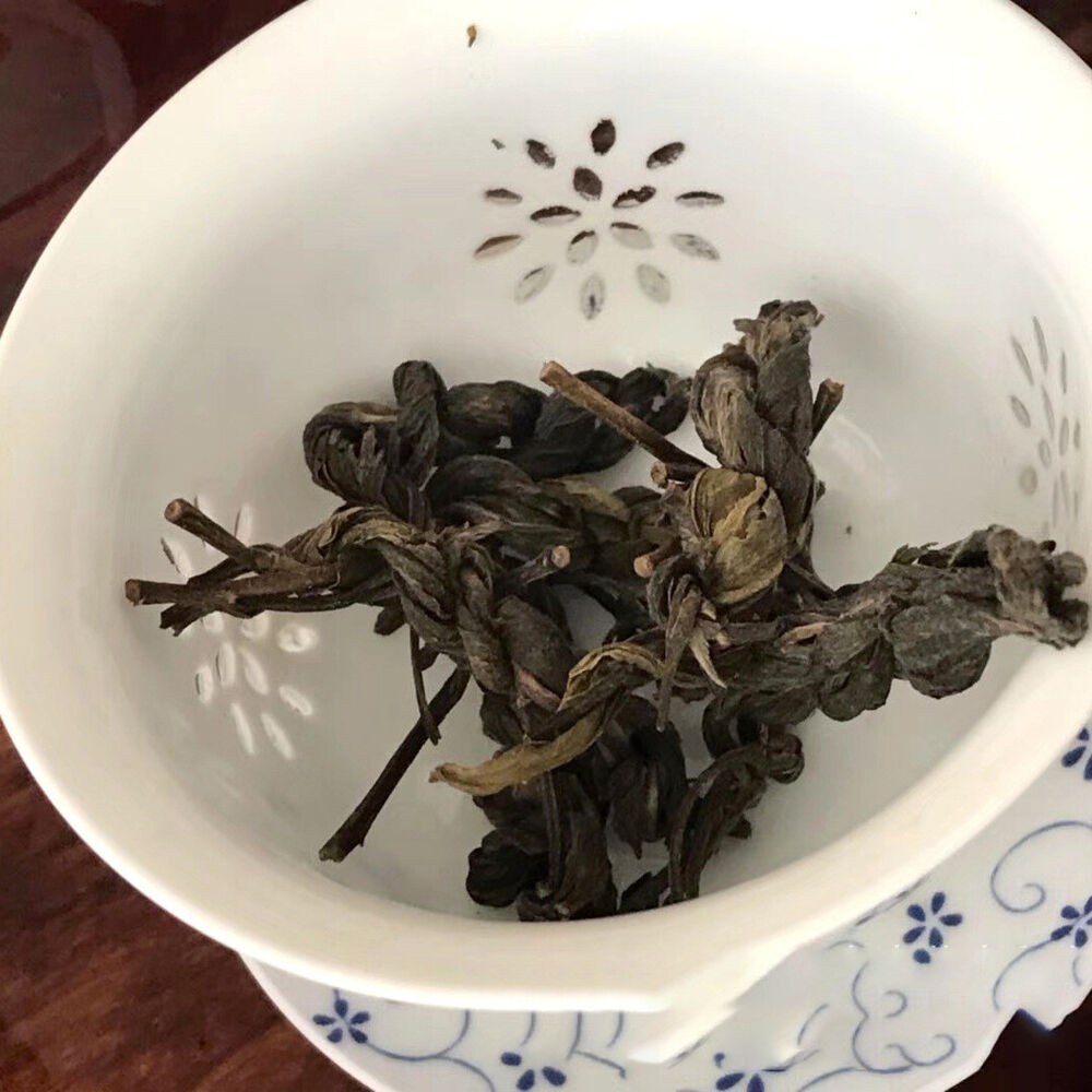 2014 Yong De Big Snow Mountain Bian Zi Pigtails Old Tree Pu'er Tea Cake Raw 400g