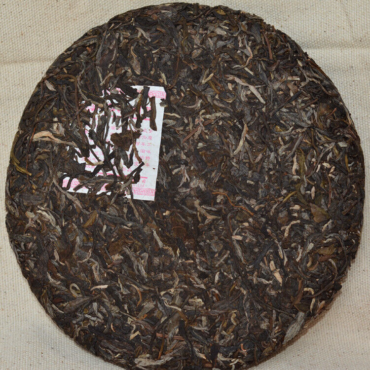2012 Xiaguan Ma Hei Yuan Cha YiWu Ancient Tree Pu-erh Tea Cake Raw Pu'er 357g