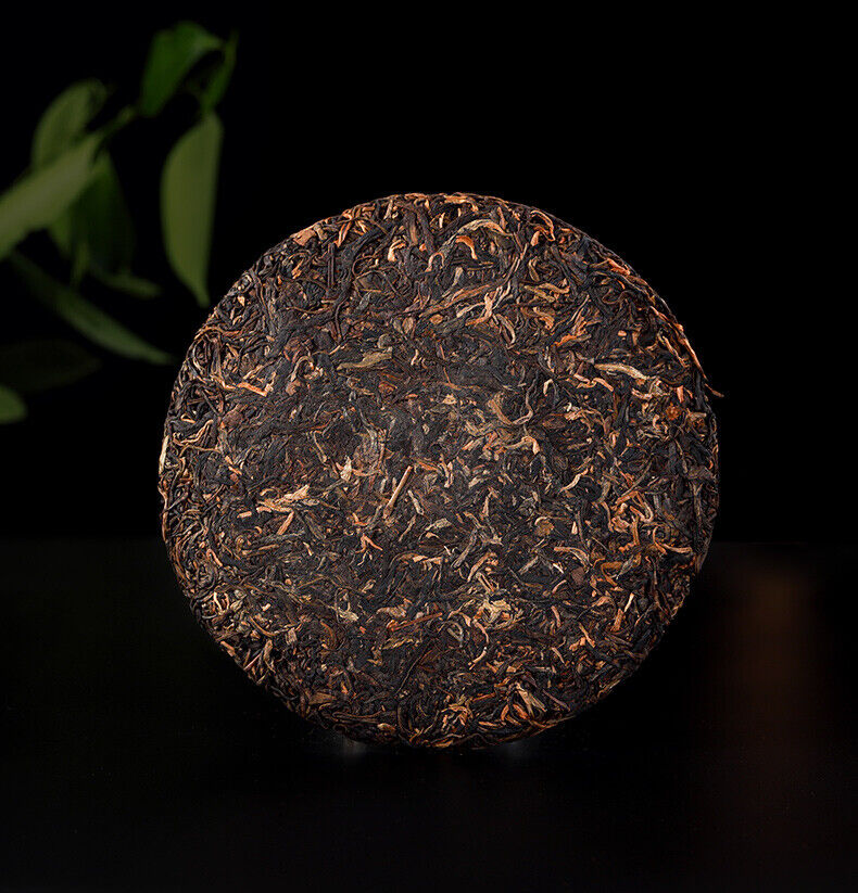 2006 Bajiaoting Valley Flower Tea Raw Pu'er KONG QUE ZHI XIANG QI ZI BING 357g