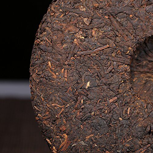 Dian Mai White Lotus puer tea cake 357g