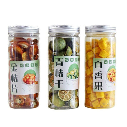 Green orange lemon passion fruit tea kumquat slices summer cold brew tea bottle