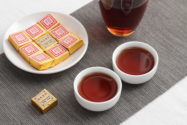 Menghai Pu'er ripe tea small square brick tea leaves sinensis word Pu'er tuocha