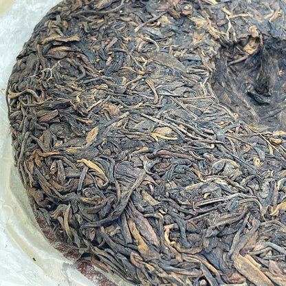 Pu 'er tea, 2006, Hong Kong version, Yi Wu Zhengshan, 357g, born.