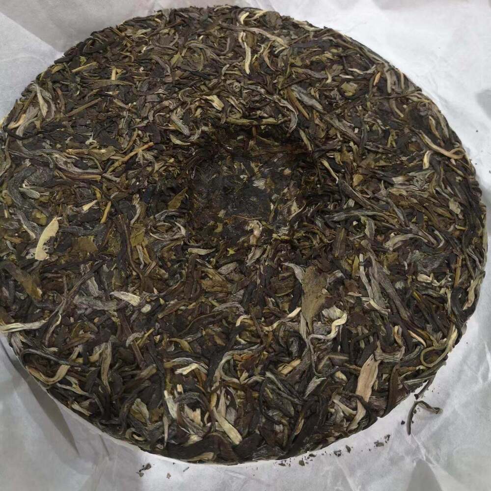 200g Iceland Ancient Tree Leaf Puerh Tea Raw Puerh Tea Cake Benefits Green Tea