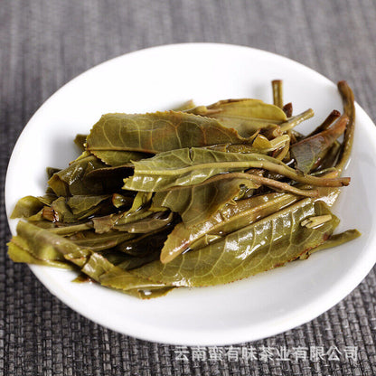 357g/12.59oz Pu'er Tea Da Xueshan Early Spring Ancient Raw Tea Seven Seed Cake