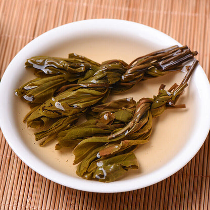 2014 Yong De Big Snow Mountain Bian Zi Pigtails Old Tree Puer Tea Cake Raw 400g