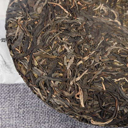 357g/12.59oz/cake Mint Pond Fresh Tea Cake Yiwu Mint Pond Spring Fresh Cake Tea