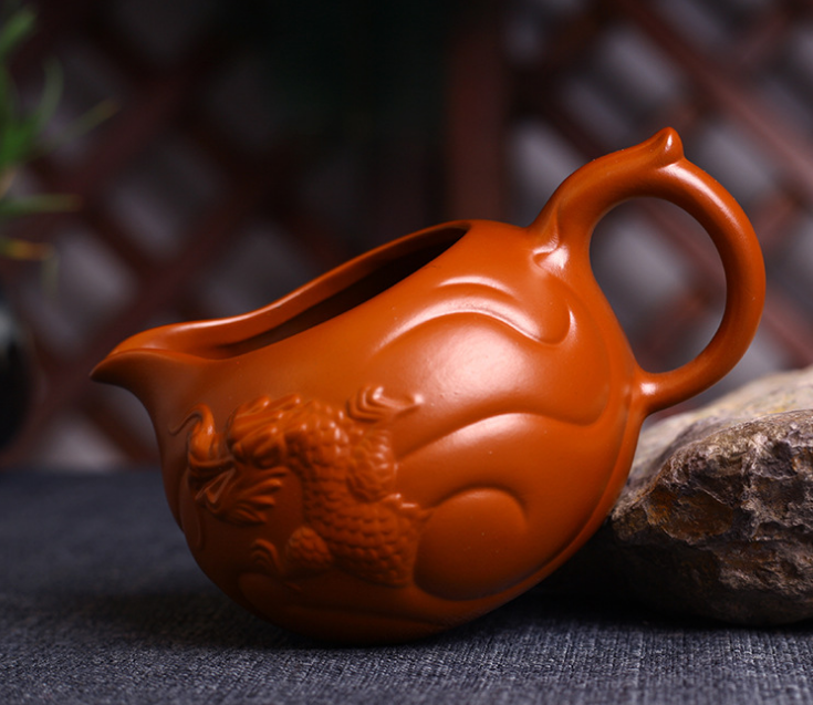 Yixing genuine handmade raw ore Dahongpao fish Hualong fair cup purple clay pot