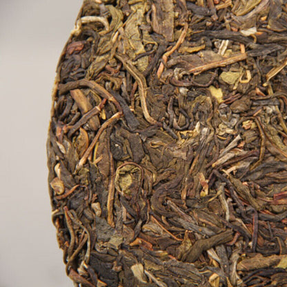 357g Classical Early Spring Puerh Puer Tea Nannuo Mountain Qizi Tea Cake