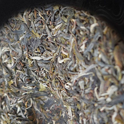 Lincang Pu'er Tea Yunnan Big Snow Mountain Pu'er Tea Ancient Tree Cake Tea