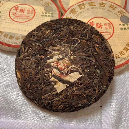 2005 Macau Hualian Banzhang Wild Ancient Tree Tea Laser Label Qizi Cake Tea 200g