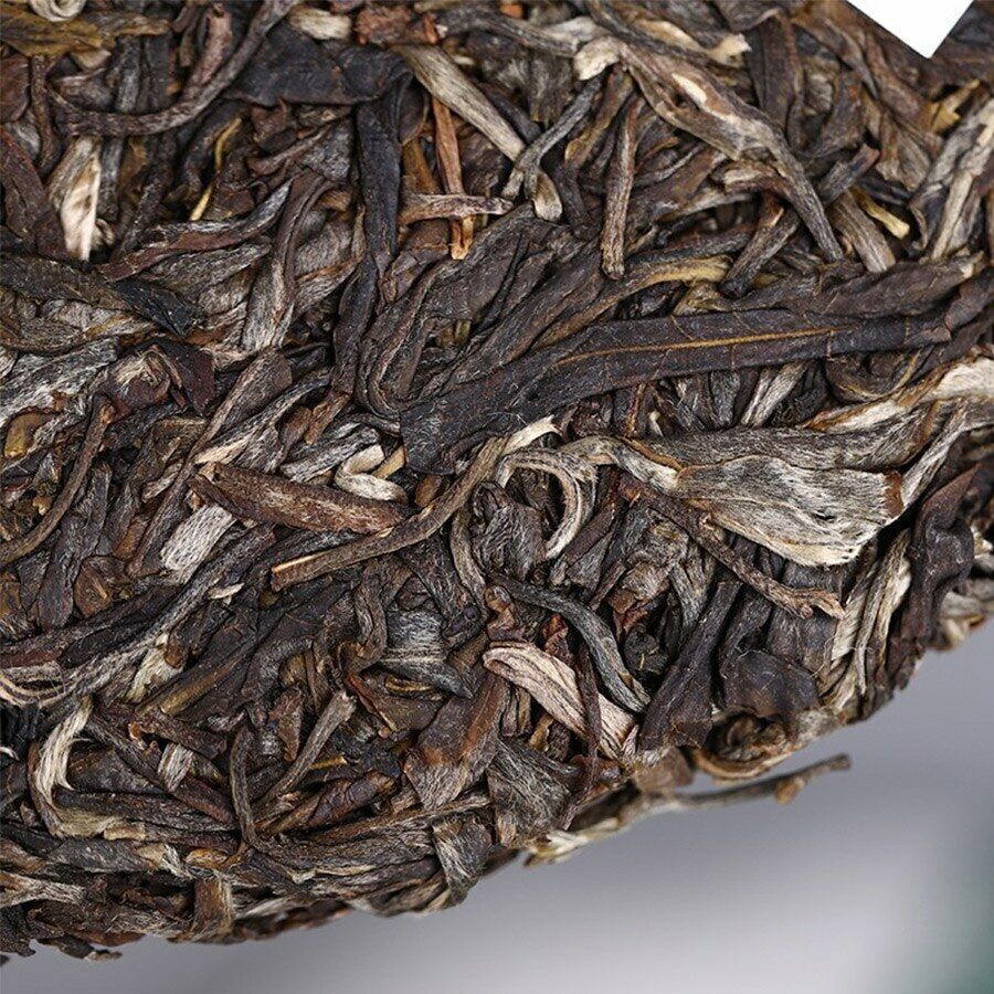 Top Lao Tong Zhi 9948 Raw Pu-erh Tea Haiwan Old Comrade Shen Puer Tea Cake 357g