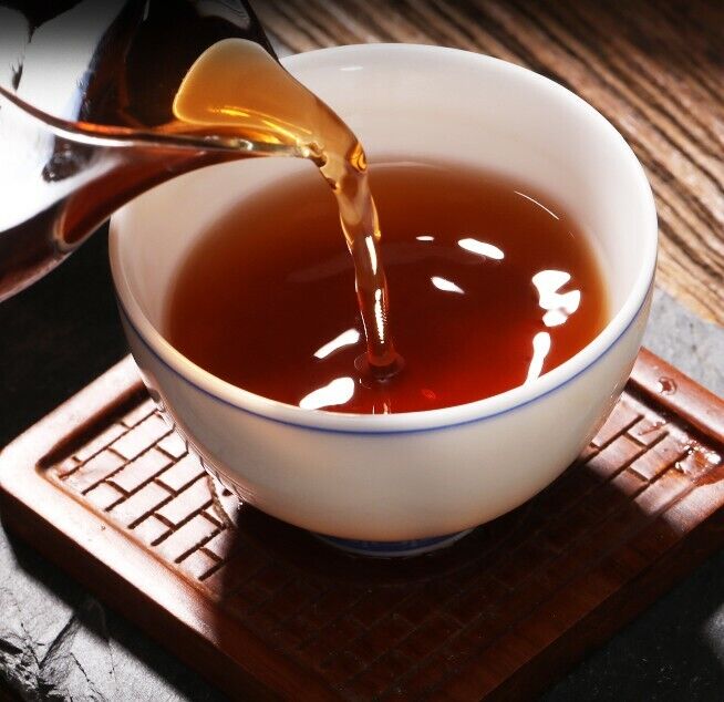Cooked tea wrapped in gold foil gift casserole tea Pu 'er tea tea high tea cream-