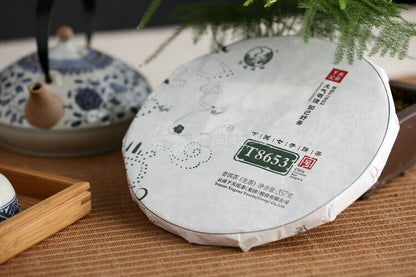 Jin Bang Series T8653 Tie Bing * 2015 Xiaguan Pu'er Pu-erh Raw Green Tea 357g