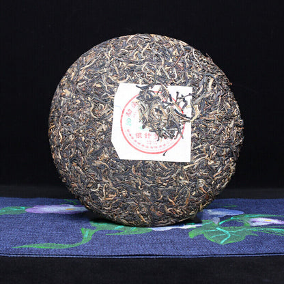 Yin Zhen Gong Bing 2007 Nanqiao Menghai Qiao Mu Sheng Tai Cha Puer Raw Tea 250g