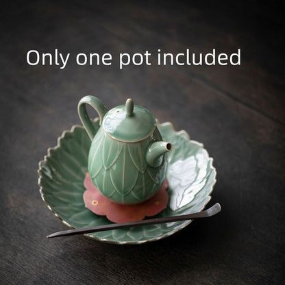 180ml Yue kiln porcelain tea pot with ball shaped infuser holes lotus relief pot