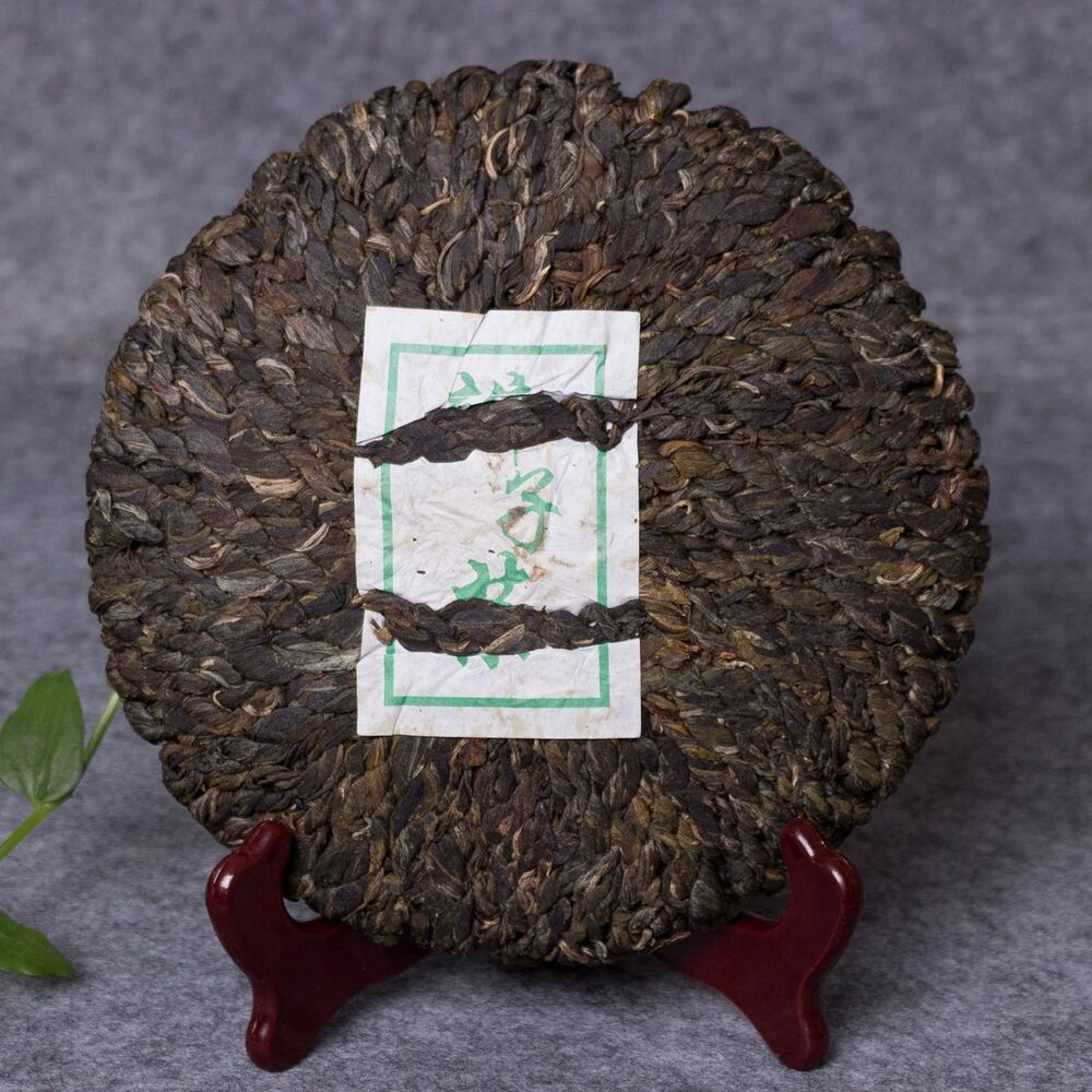 2014 Yong De Big Snow Mountain Bian Zi Pigtails Old Tree Pu'er Tea Cake Raw 400g