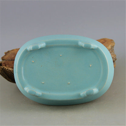 Chinese Song Dynasty Ru Kiln celadon four legged narcissus basin