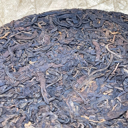 Pu-erh tea,late 80s,英敏號Ying Min, 遠年七子餅茶Yuannian Qizi Cake Tea,357g,Raw