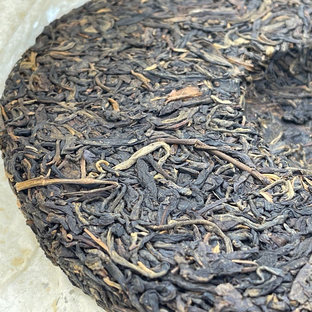 Pu-erh tea,2009,Mengku Daxue Mountain Arbor Old Tree Cake Tea,357g,Raw