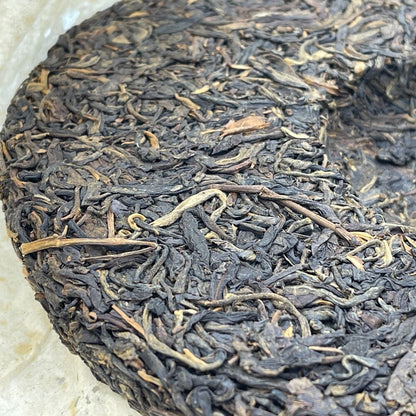 Pu-erh tea,2009,Mengku Daxue Mountain Arbor Old Tree Cake Tea,357g,Raw