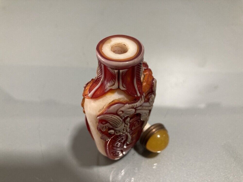 Fine red chinese snuff bottles peking glass overlay carved antique dragon statue
