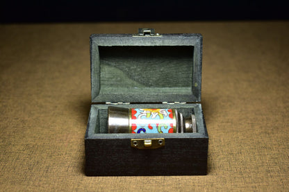 An ancient brass based cloisonne telescope