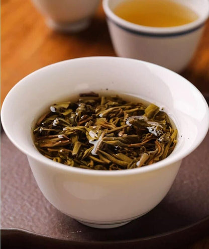 Haiwan LAO TONG ZHI Batch 221 Old Comrade 7548 Pu-erh Tea Cake RAW puer tee 357g