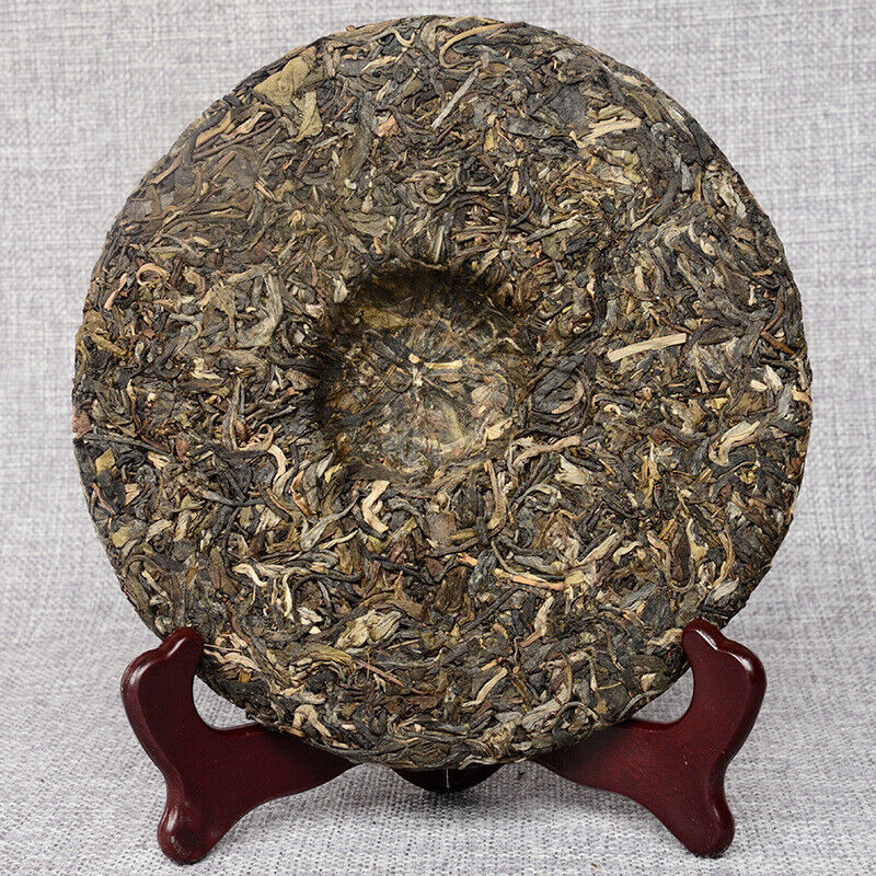 Ancient Tree Tea Yunnan Seven Seed Cake Tea 357g Pu'er Tea 2014 Spring Tea-