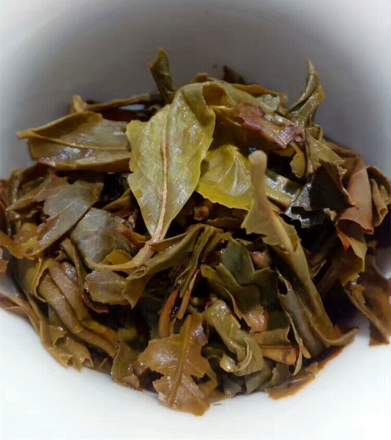 357g Pu'er raw tea golden leaves golden Mengku yellow slices, seven seed cakes