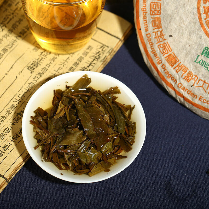 2003 Kong Ming Mountain Pressed Qizi Cake of Yiwu Classic Tea Puer Raw 357g