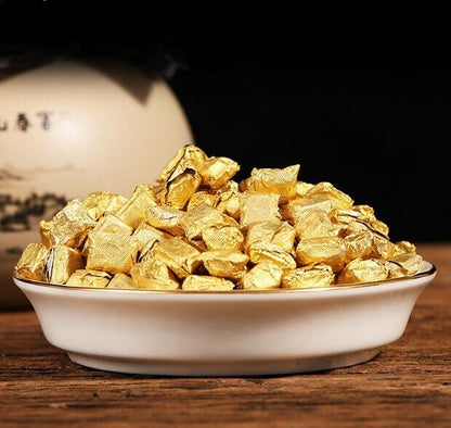 Cooked tea wrapped in gold foil gift casserole tea Pu 'er tea tea high tea cream-
