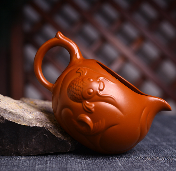 Yixing genuine handmade raw ore Dahongpao fish Hualong fair cup purple clay pot