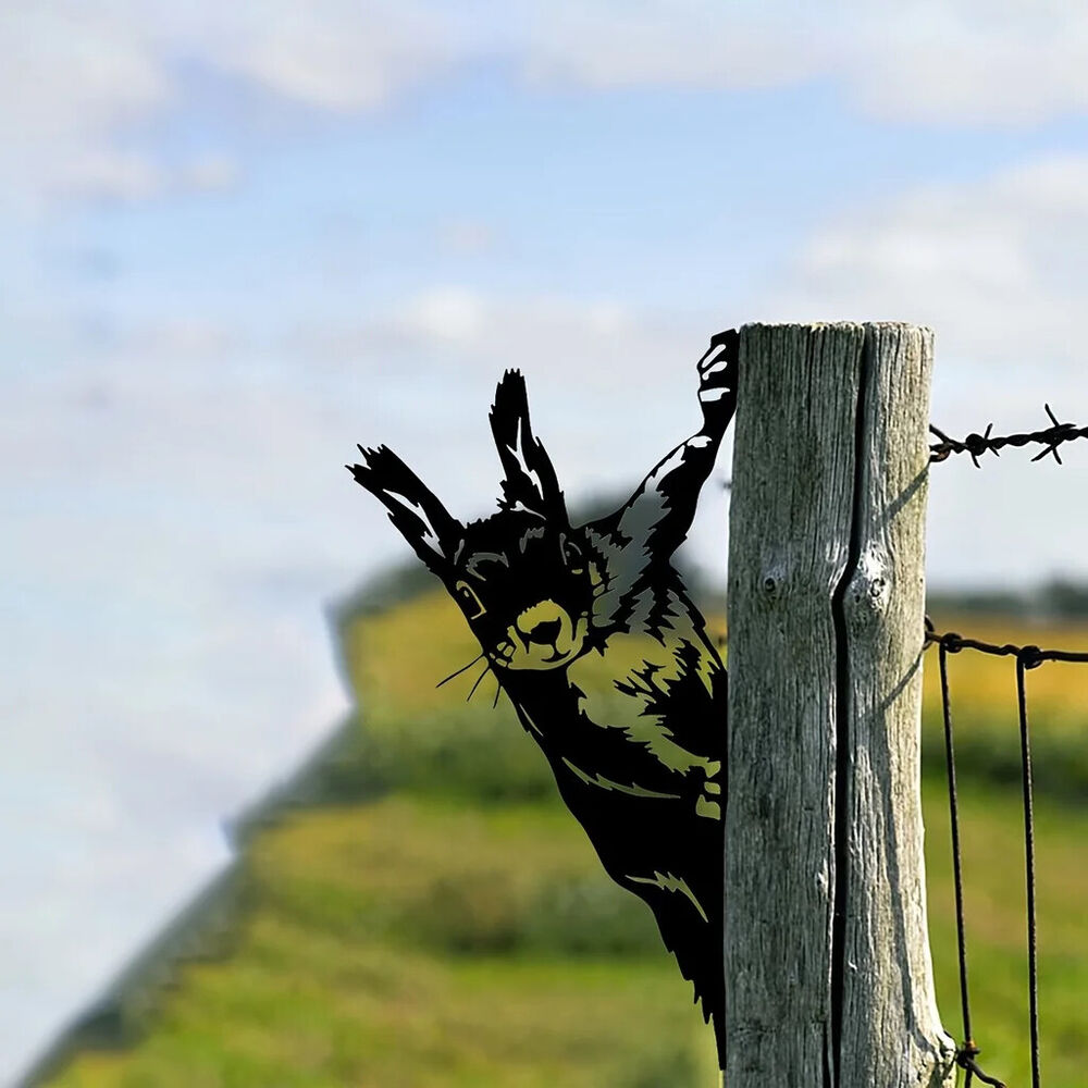 Garden with this Adorable Squirrel-Shaped Fence Ornament