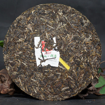 357g Shang Pin Golden Ribbon Big Snow Mountain Xiaguan Puer Aged Puerh Tea