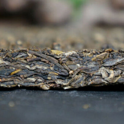 357g Raw Puerh Tea Shang Pin Golden Ribbon Big Snow Mountain Xiaguan Puer