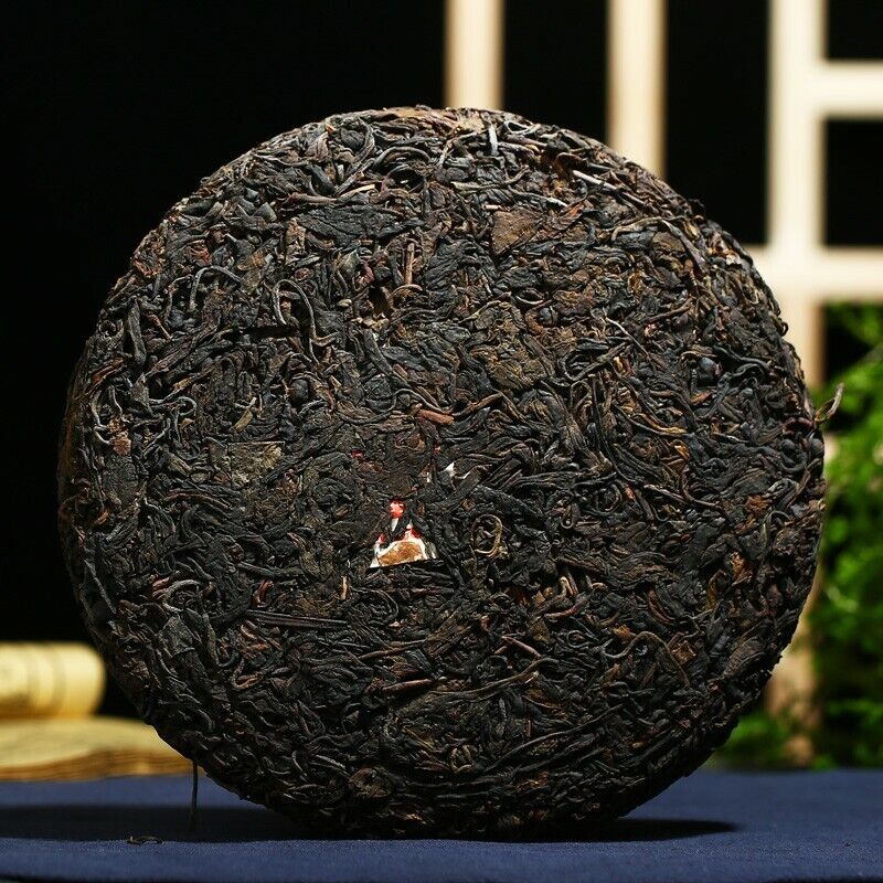 2003 Kong Ming Mountain Pressed Qizi Cake of Yiwu Classic Tea Puer Raw 357g