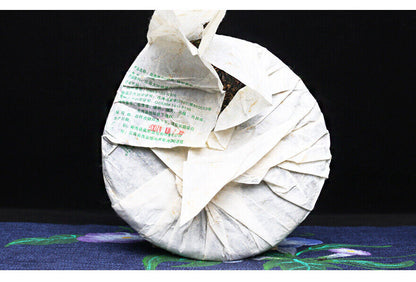 Yin Zhen Gong Bing 2007 Nanqiao Menghai Qiao Mu Sheng Tai Cha Puer Raw Tea 250g
