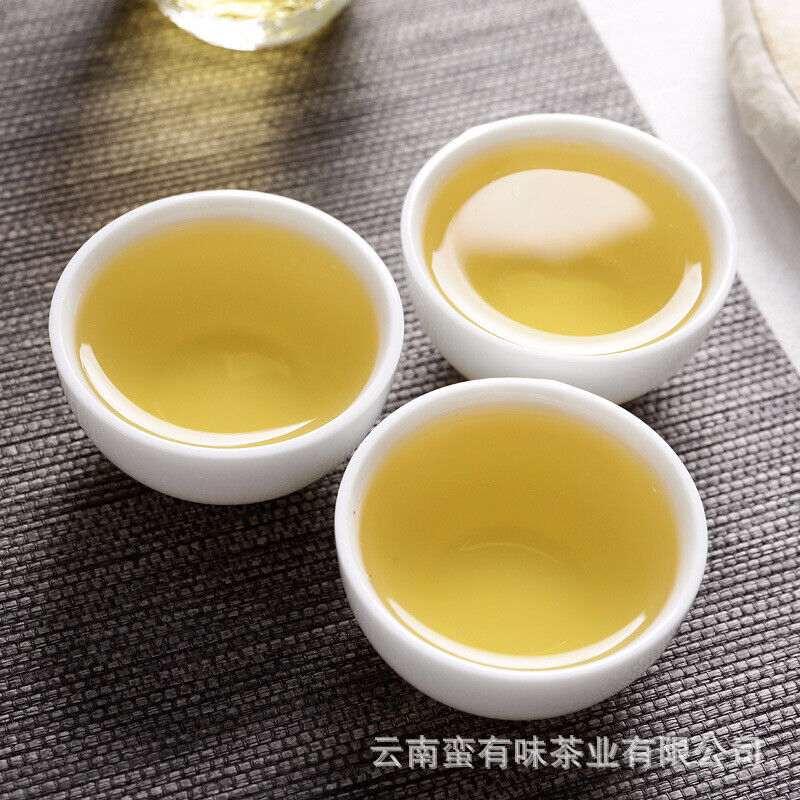 357g/12.59oz Pu'er Tea Da Xueshan Early Spring Ancient Raw Tea Seven Seed Cake