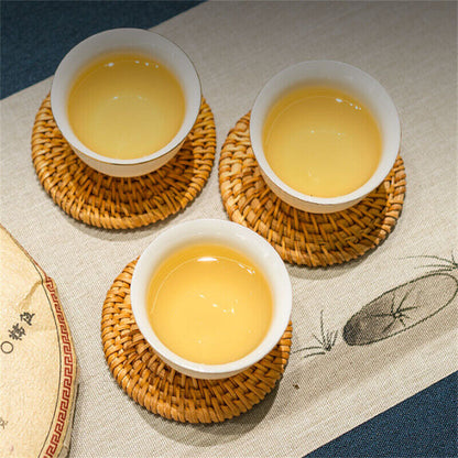 100g Pu'er Raw Tea Iceland Yunnan Ancient Tea Spring Tea Cake Orchid Fragrance