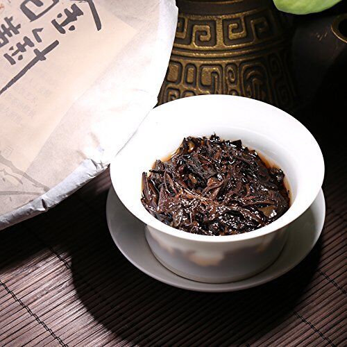Dian Mai White Lotus puer tea cake 357g