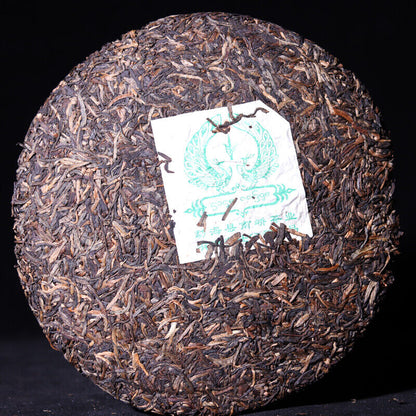 2006 Silver Needle Tributary Puer Meng Hai Qiao Mu Ye Sheng Cha Raw Pu'er 250g