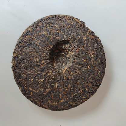 7038 Early Spring Yinhao Haiwan Lao Tong Zhi Old Comerade Pu'er Tea Raw 400g